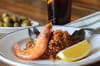 Paella að eigin vali og eftirréttur ásamt vínglasi
