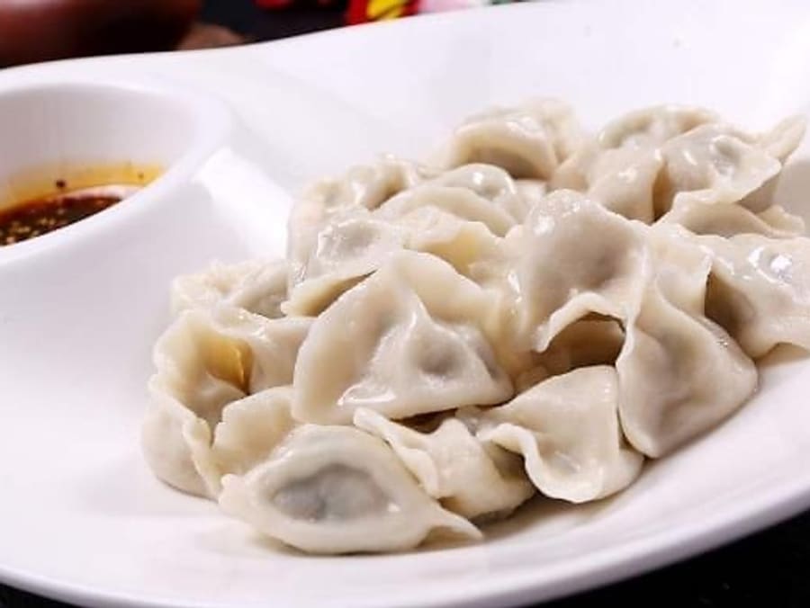 9. Soðin dumpling með svínakjöti (15stk)