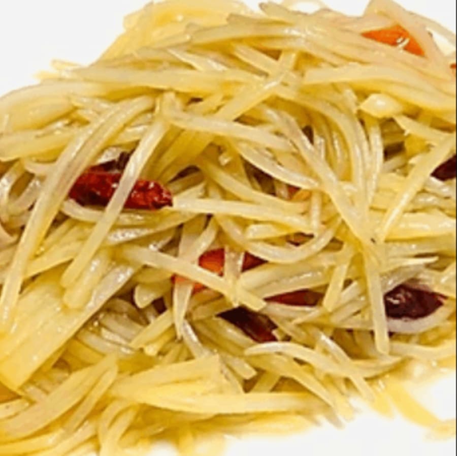 35. Pan fried shredded potatoes